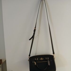 Coach Elegant Black Crossbody Bag with Gold Details